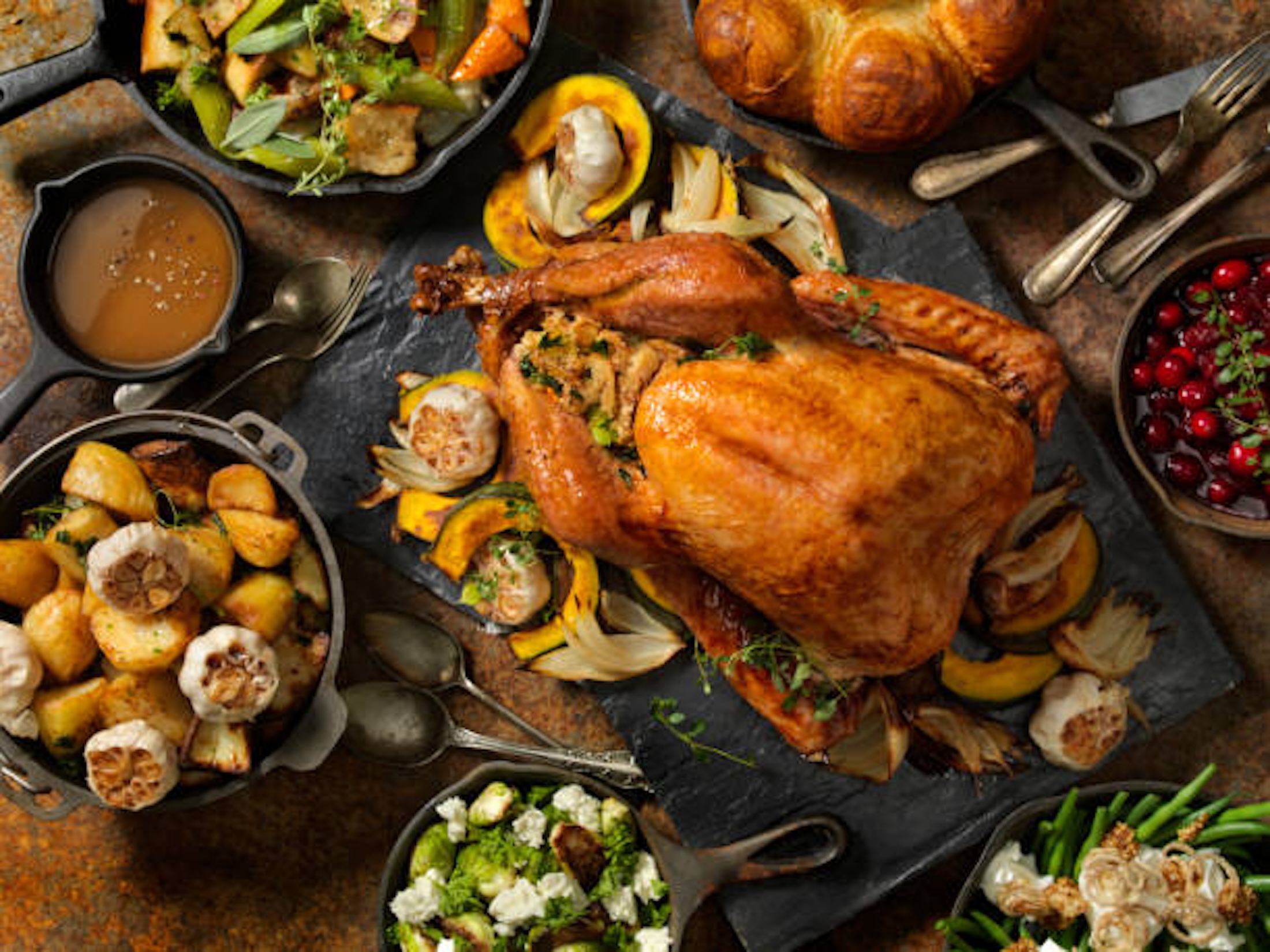 A top down view of a Thanksgiving roast turkey dinner.