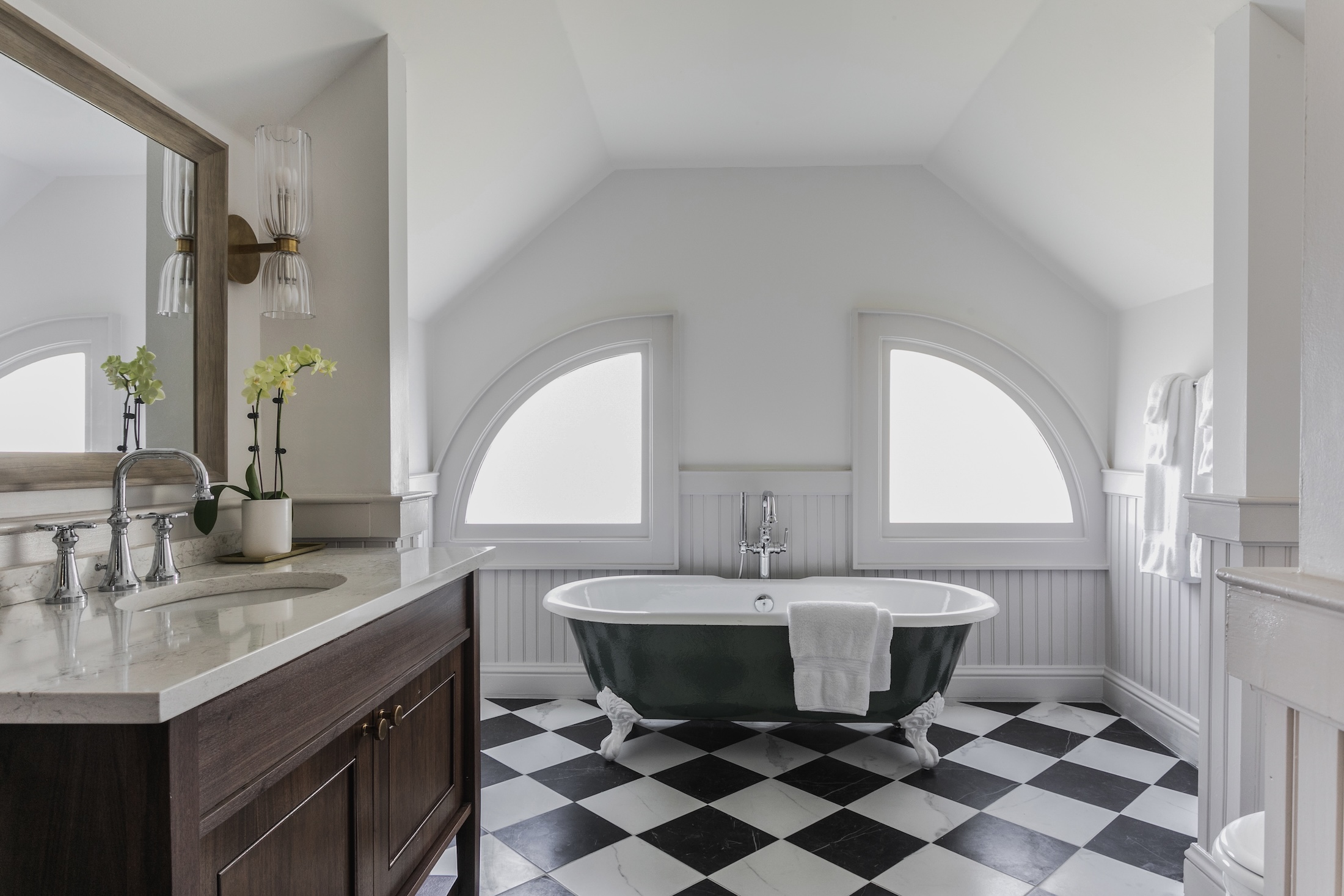 The clawfoot tub in a large bathroom at Wheaton Cottage.